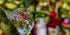 Fine Art Print einer Glaskugel Fotografie im japanischen Garten unter einer Kirschblüte, im Hintergrund ein japanisches Haus und ein grün-rotes weichfließendes Bokeh