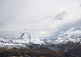Fine Art Print des Matterhorns mit angrenzendem Alpenpanorama und dramatischen Wolken